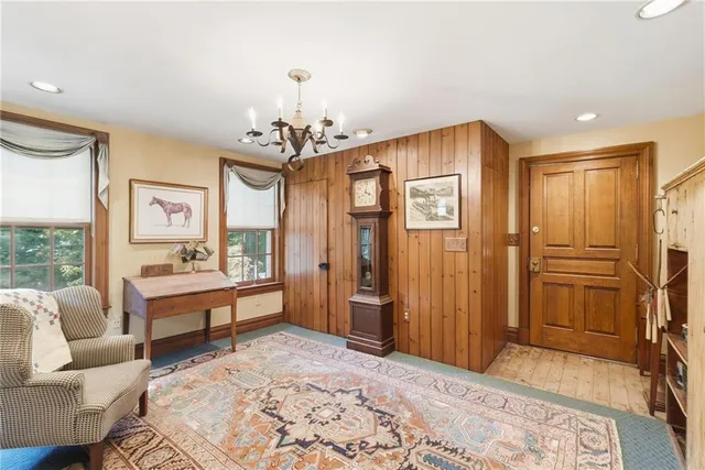 a spacious bedroom with a bed and a couch