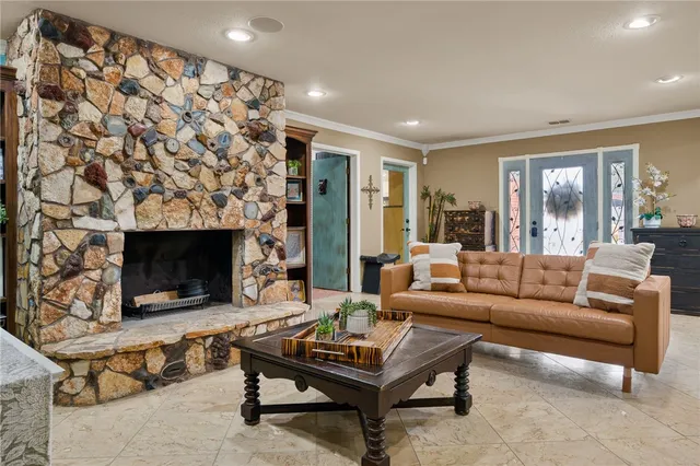 a large kitchen with stainless steel appliances lots of counter top space