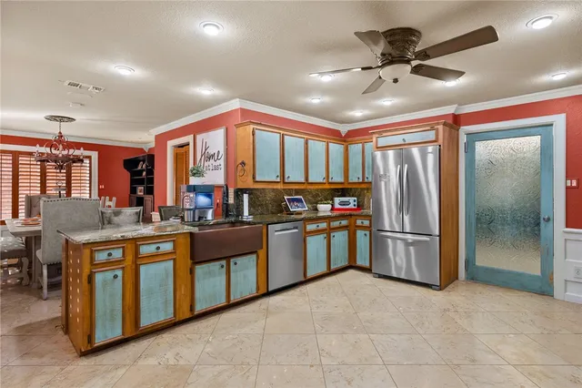 a view of a dining room with furniture and window