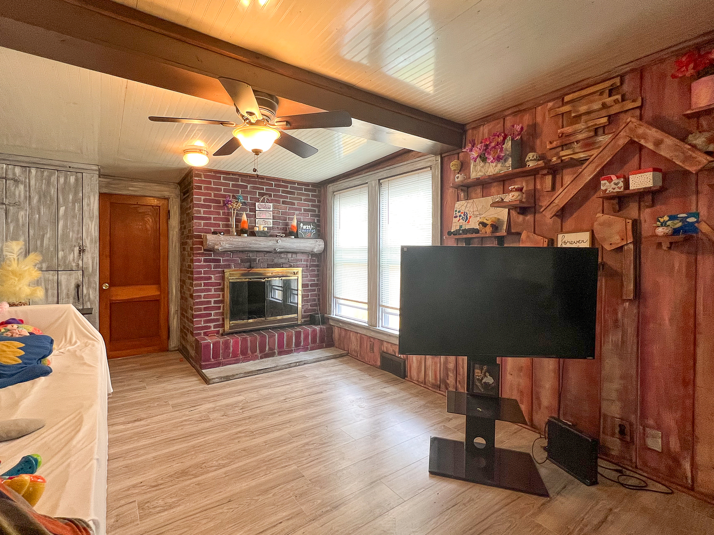 415 South 3rd Street Rochelle, IL 61068 - Photo 12 of 28 a living room with furniture and a flat screen tv