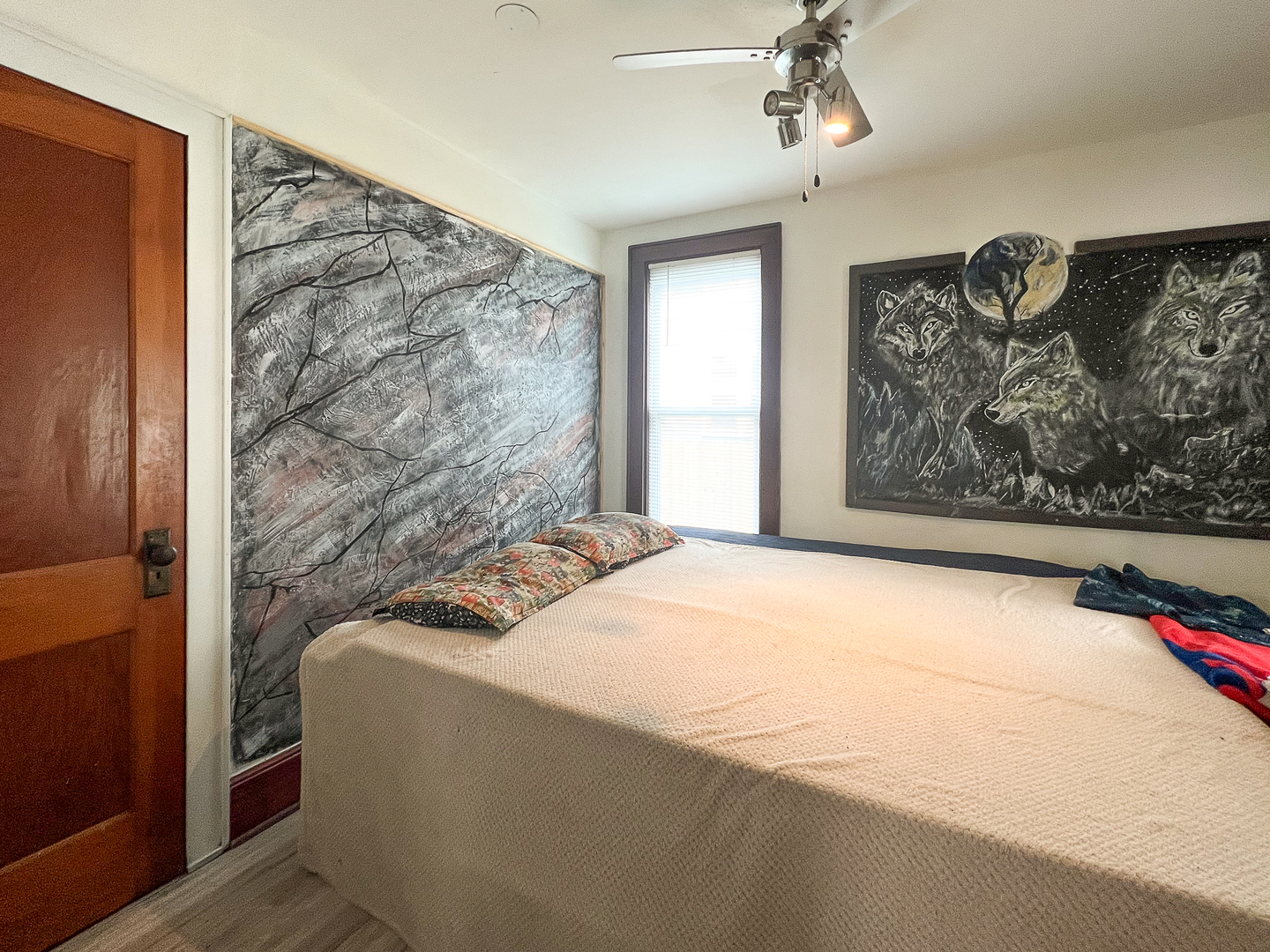415 South 3rd Street Rochelle, IL 61068 - Photo 14 of 28 a bedroom with a bed and a wall painting