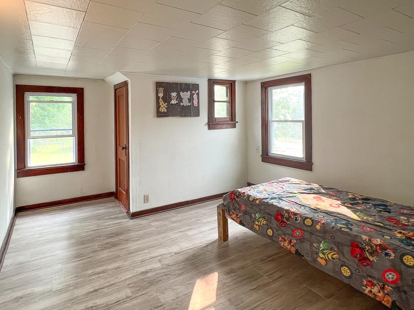 415 South 3rd Street Rochelle, IL 61068 - Photo 18 of 28 a bedroom with a bed and a window