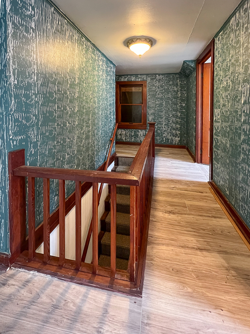415 South 3rd Street Rochelle, IL 61068 - Photo 23 of 28 a view of a porch with wooden floor