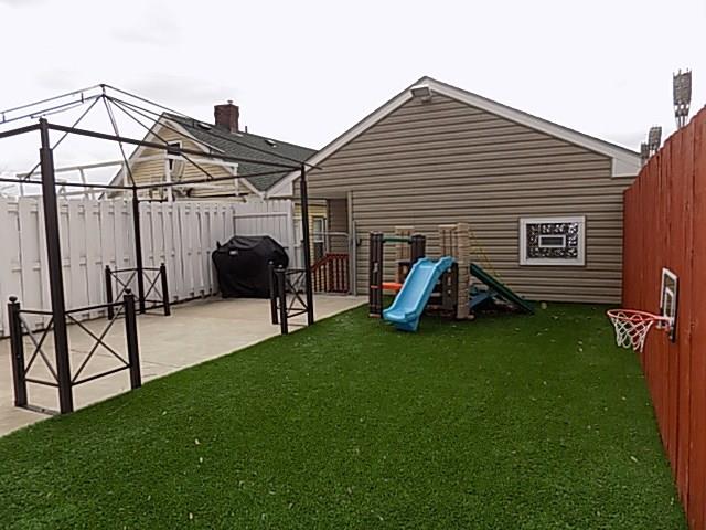 314 Hamilton Street McKees Rocks, PA 15136 - Photo 10 of 10 Yard- Private fenced in backyard patio area with built-in gazebo and play area!