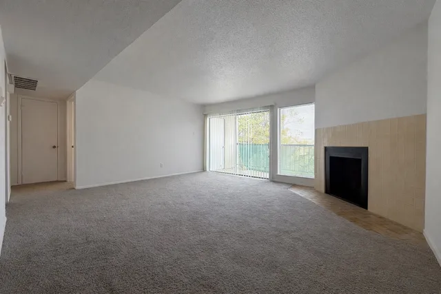 an empty room with windows