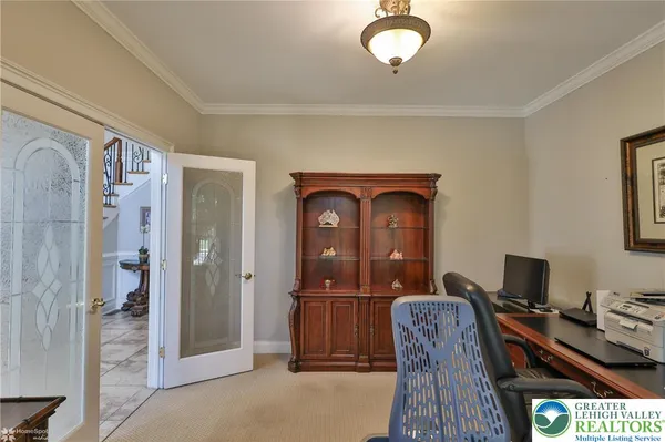 a bed room with a bed and a chandelier