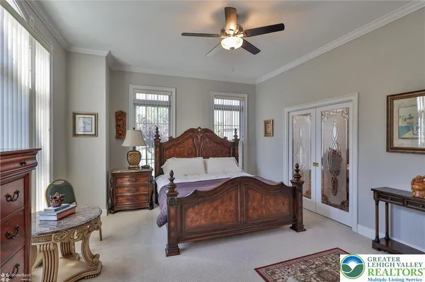 a large kitchen with a table and chairs