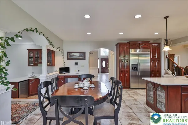 a kitchen with a sink cabinets and a window