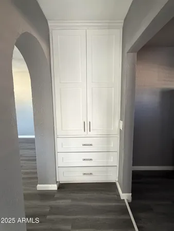 a view of an empty walk in closet