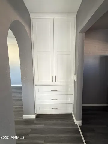 a view of an empty walk in closet