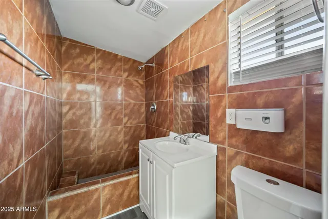 a bathroom with a sink and a shower