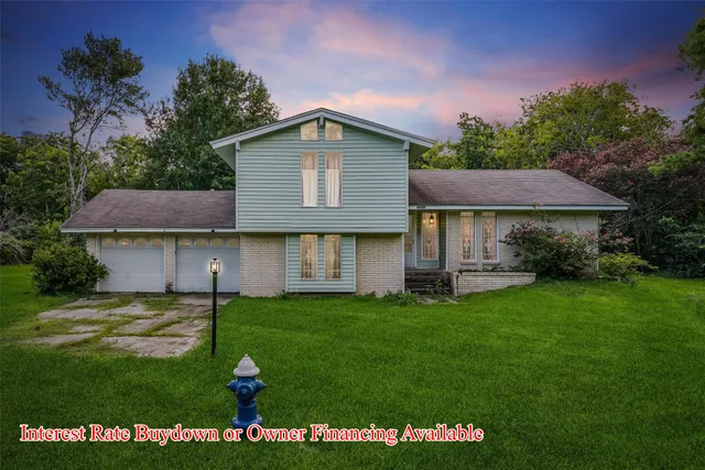 a view of a house with a garden