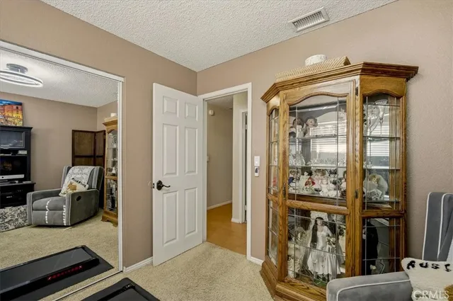 a view of living room and bedroom