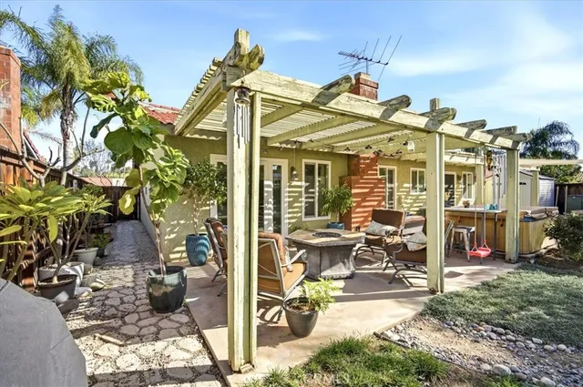 a view of multiple house with outdoor seating