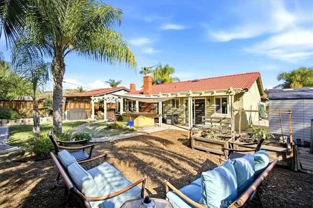an outdoor space with patio furniture