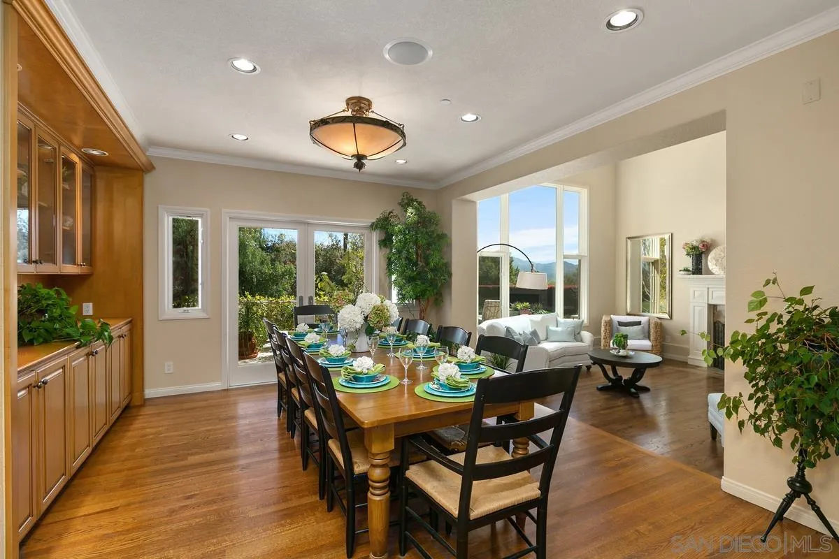 15629 Boulder Mountain Road Poway, CA 92064 - Photo 11 of 64 a view of a dining room with furniture window and wooden floor