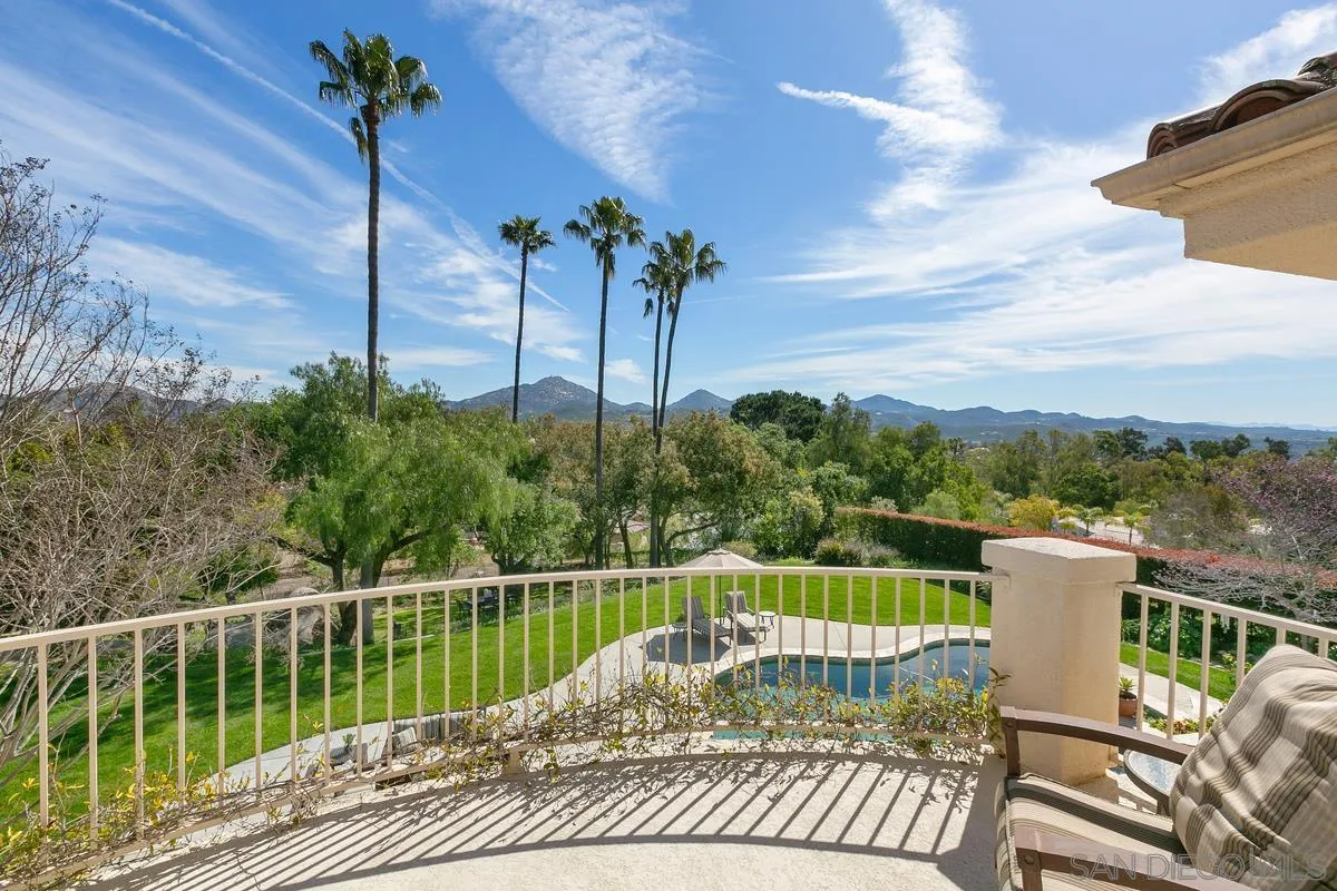 15629 Boulder Mountain Road Poway, CA 92064 - Photo 21 of 64 a view of a chair and tables in the balcony