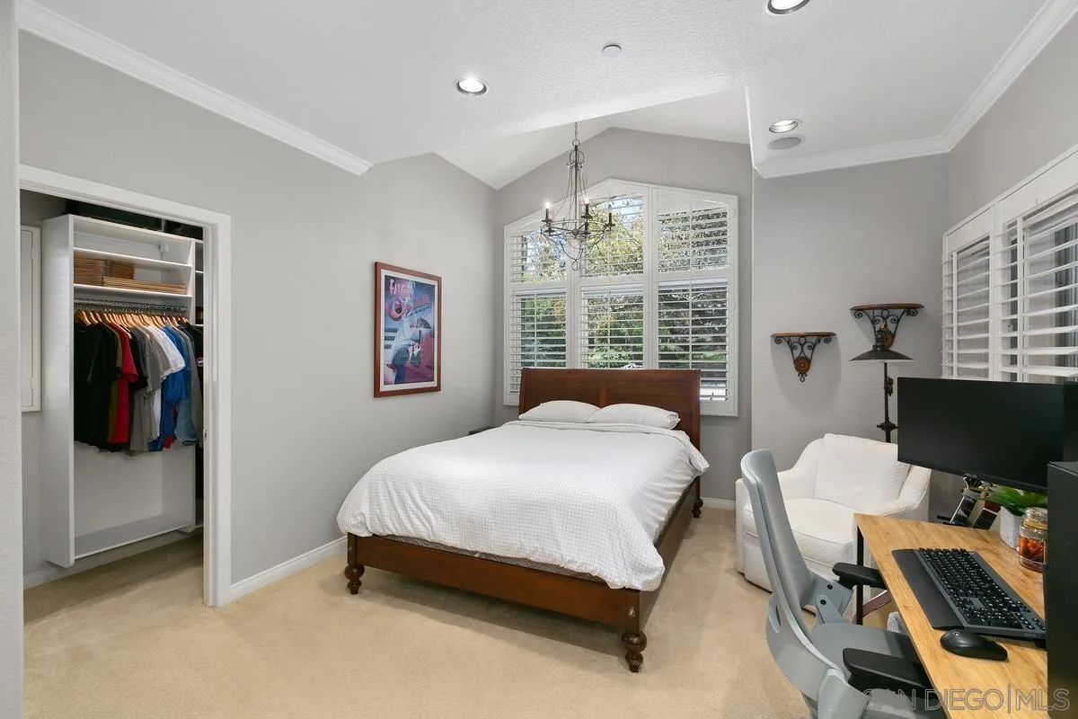15629 Boulder Mountain Road Poway, CA 92064 - Photo 29 of 64 a bedroom with a bed and a window