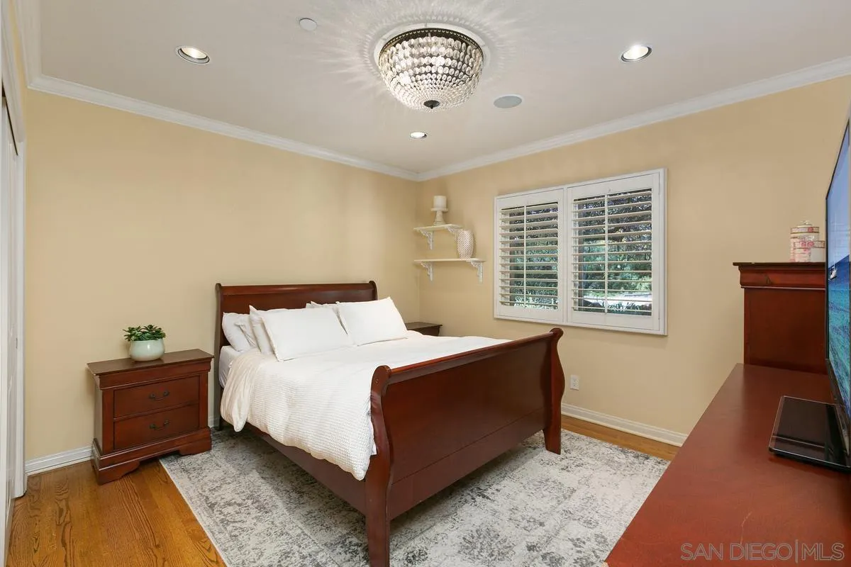 15629 Boulder Mountain Road Poway, CA 92064 - Photo 30 of 64 a bed room with a bed and a chair