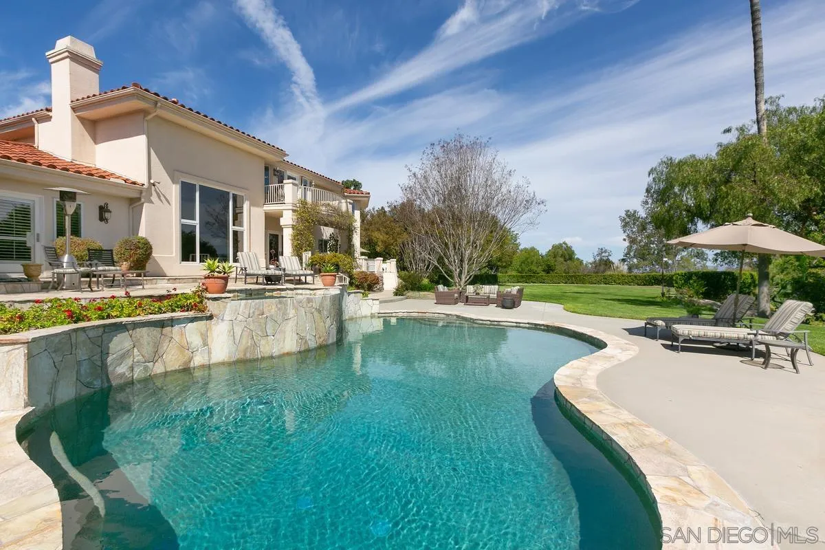 15629 Boulder Mountain Road Poway, CA 92064 - Photo 45 of 64 a view of a swimming pool with a patio