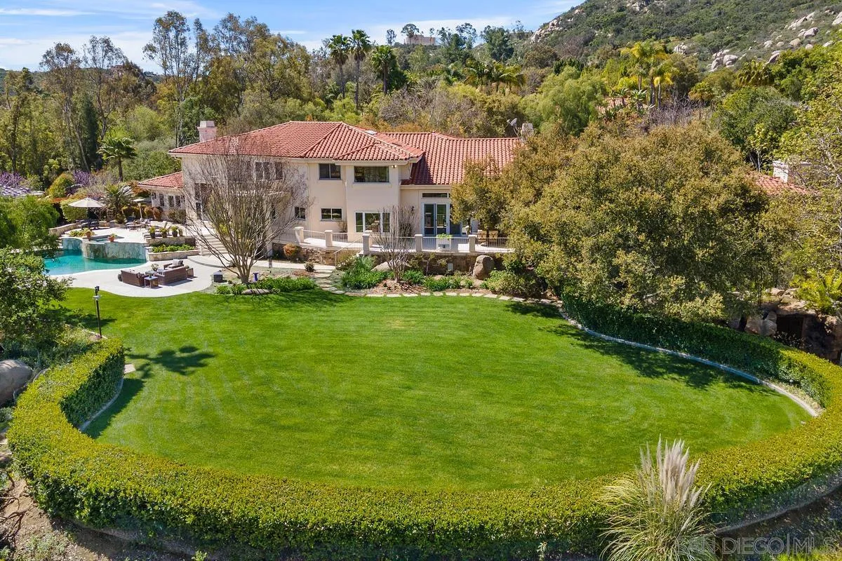 15629 Boulder Mountain Road Poway, CA 92064 - Photo 48 of 64 a view of a house with a big yard