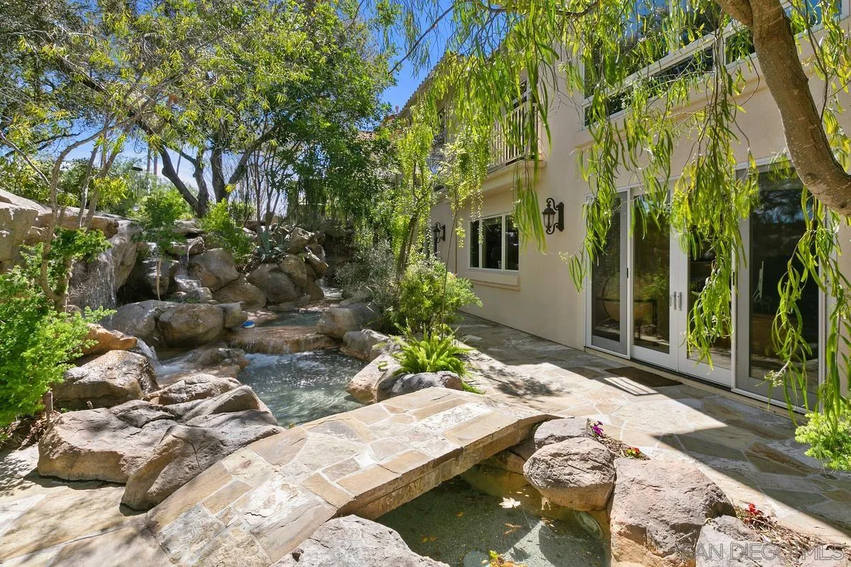 15629 Boulder Mountain Road Poway, CA 92064 - Photo 50 of 64 a view of backyard of house with green space