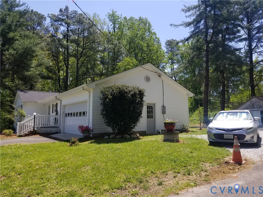 22417 Cox Road Sutherland, VA 23885 - Photo 2 of 22 a view of backyard with garden and entertaining space