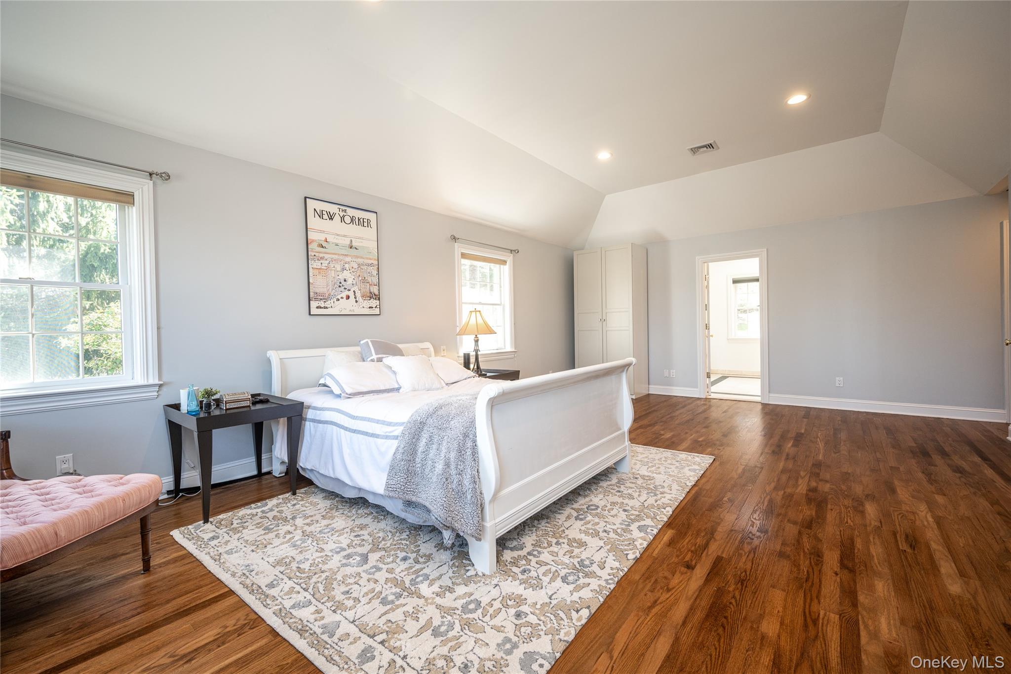 178 Hirst Road Briarcliff Manor, NY 10510 - Photo 19 of 39 Bedroom featuring recessed lighting, vaulted ceiling, dark wood-style floors, and connected bathroom