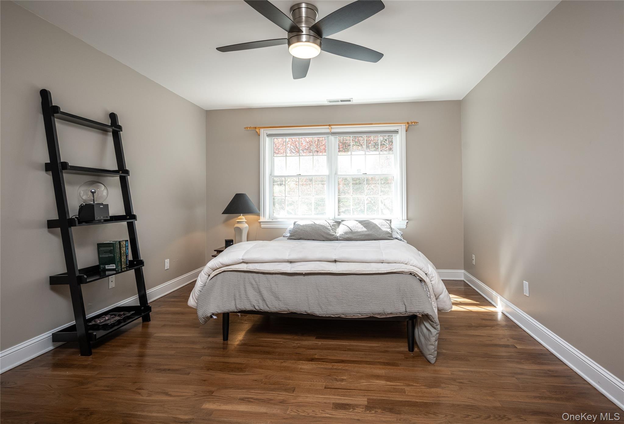 178 Hirst Road Briarcliff Manor, NY 10510 - Photo 24 of 39 Bedroom with dark wood-style floors and a ceiling fan