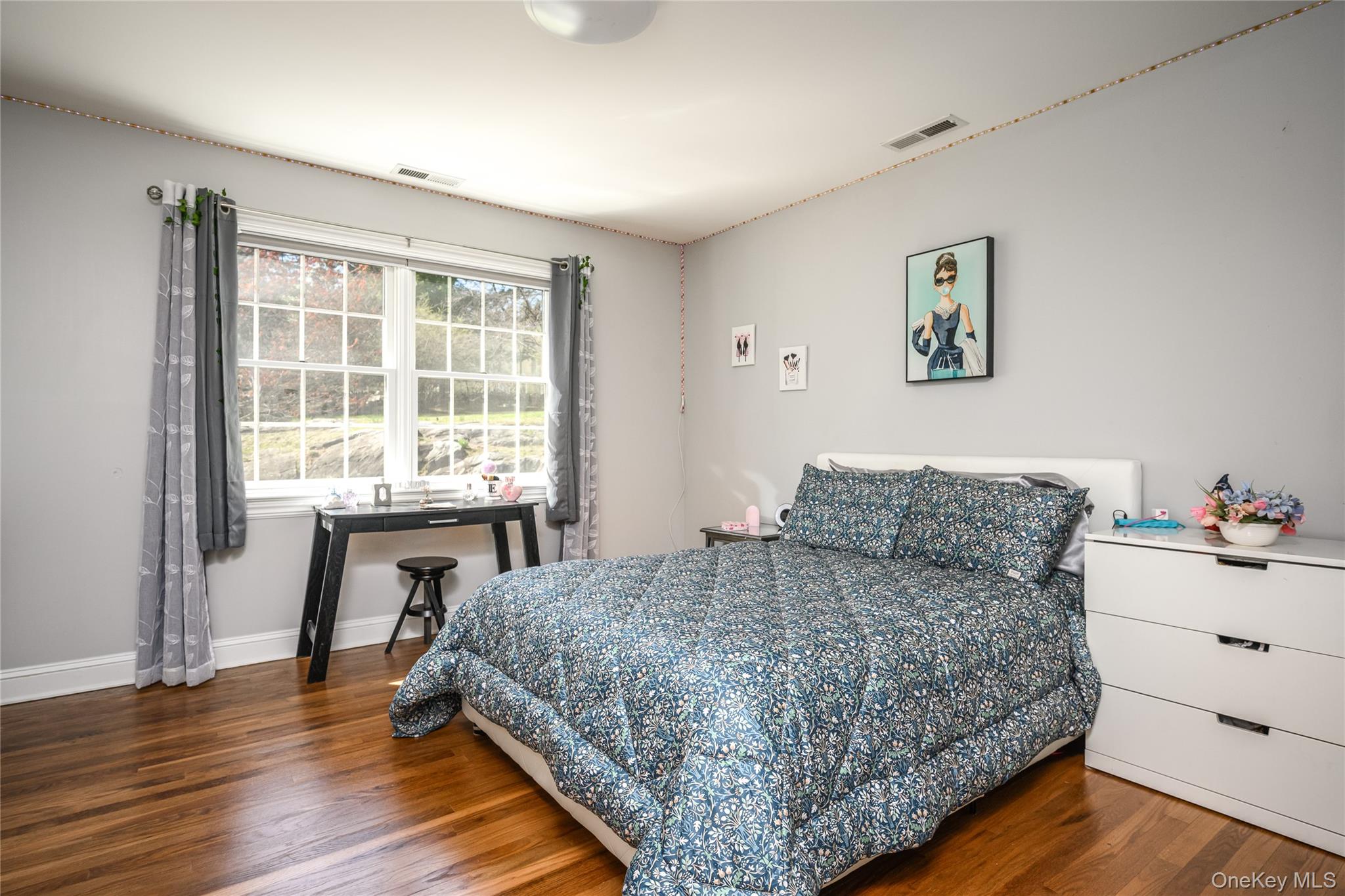 178 Hirst Road Briarcliff Manor, NY 10510 - Photo 25 of 39 Bedroom featuring dark wood-type flooring and baseboards