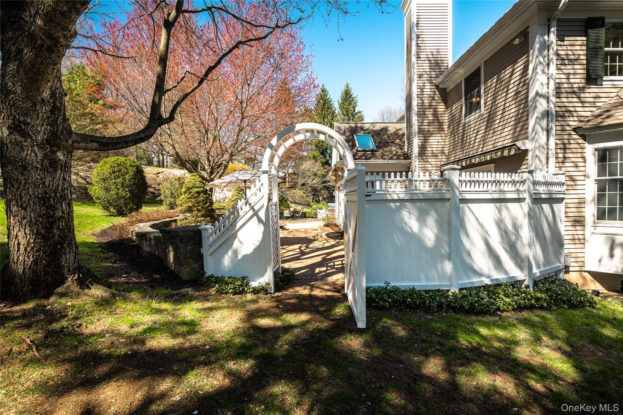 178 Hirst Road Briarcliff Manor, NY 10510 - Photo 33 of 39 View of side of property featuring a chimney and a lawn