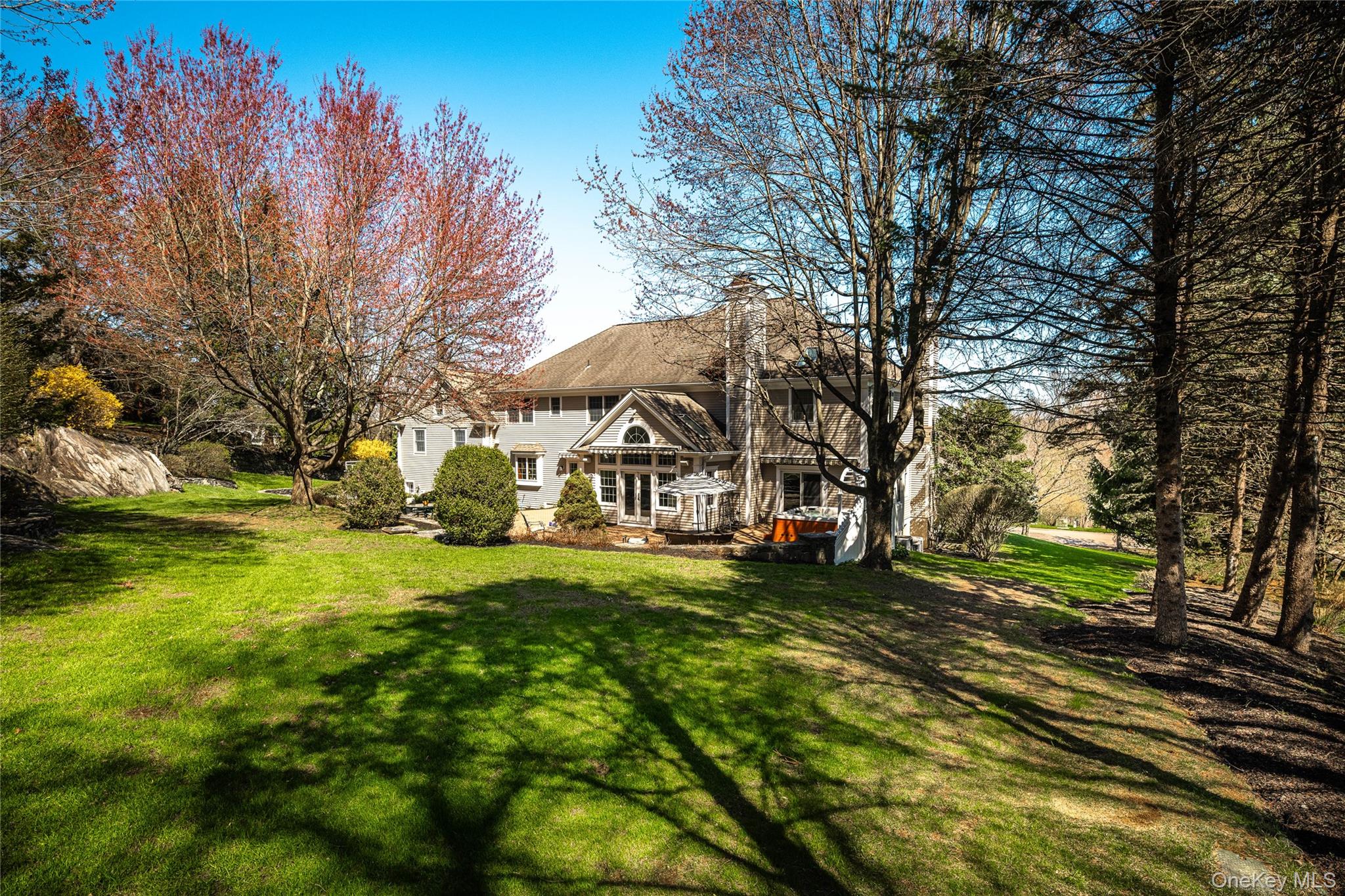 178 Hirst Road Briarcliff Manor, NY 10510 - Photo 36 of 39 Back of property with a chimney and a yard