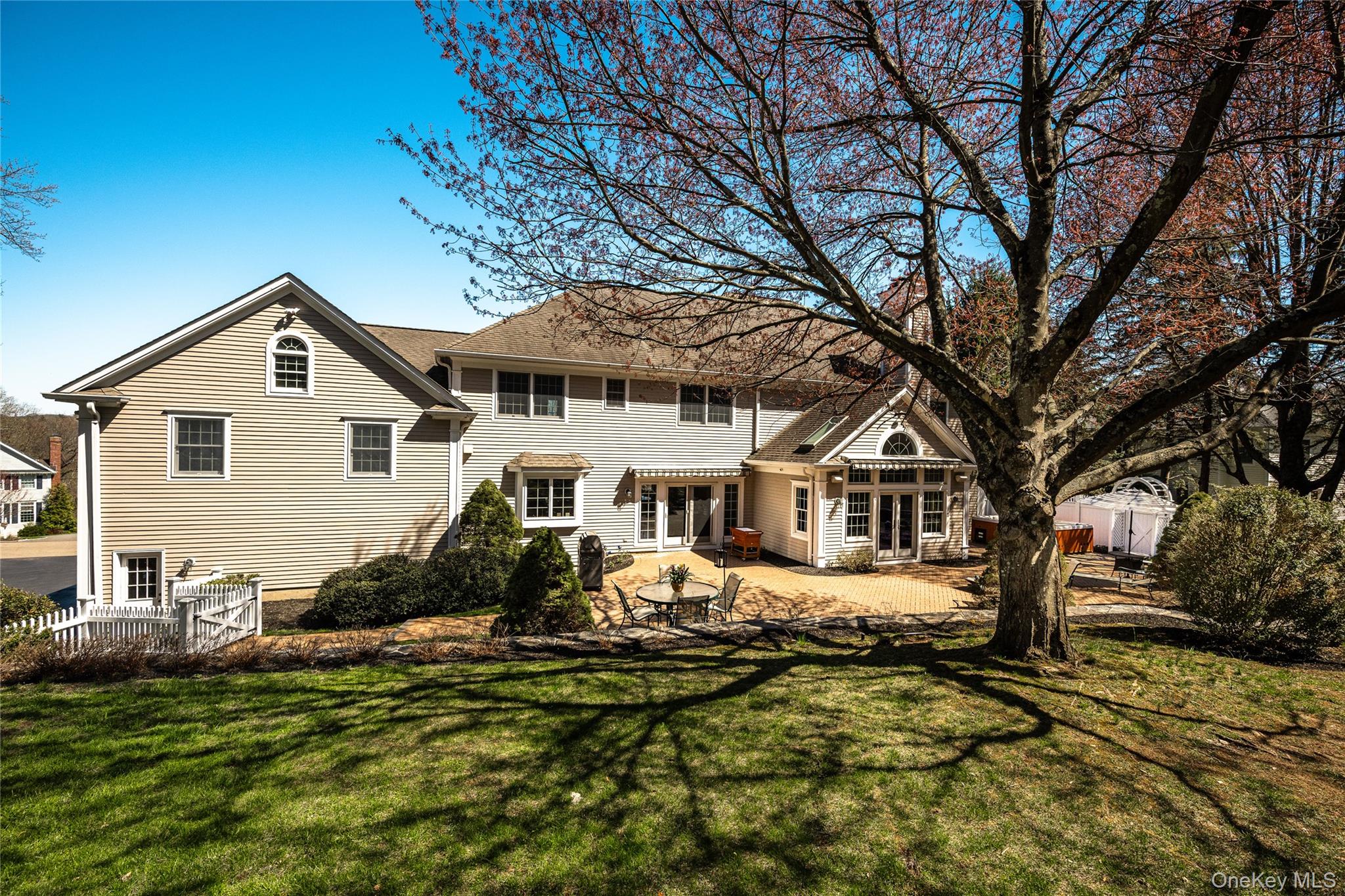 178 Hirst Road Briarcliff Manor, NY 10510 - Photo 38 of 39 Rear view of property with a patio and a sunroom