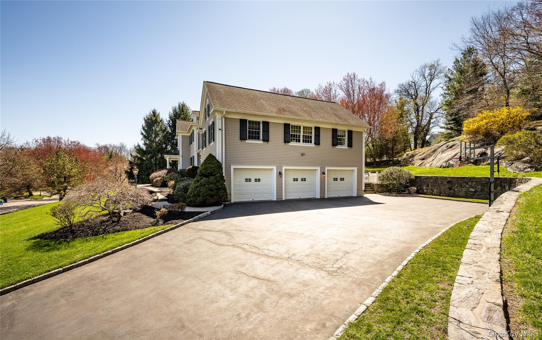 178 Hirst Road Briarcliff Manor, NY 10510 - Photo 39 of 39 View of home's exterior with driveway and a garage
