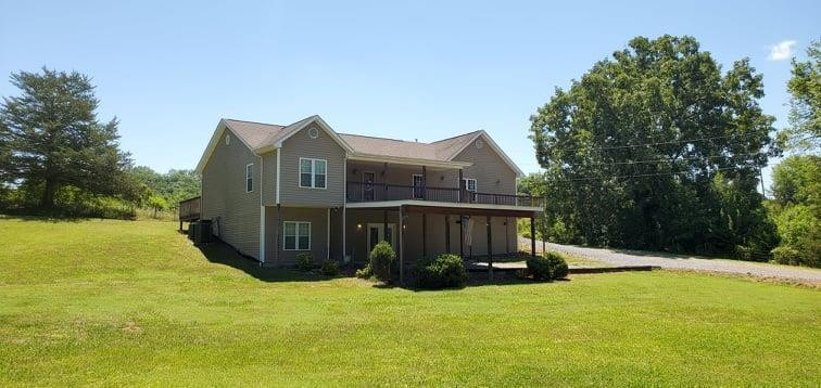 767 Lane Hollow Road Sevierville, TN 37876 - Photo 1 of 31 a view of a house with a yard