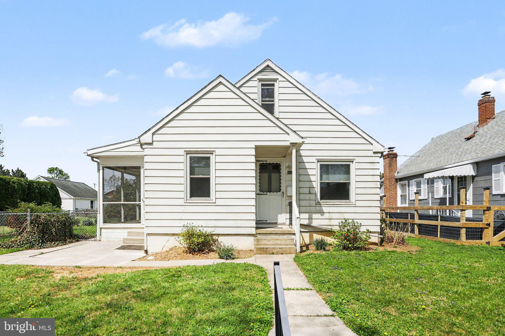 932 East Walnut Street Hanover, PA 17331 - Photo 2 of 44 a front view of a house with a yard