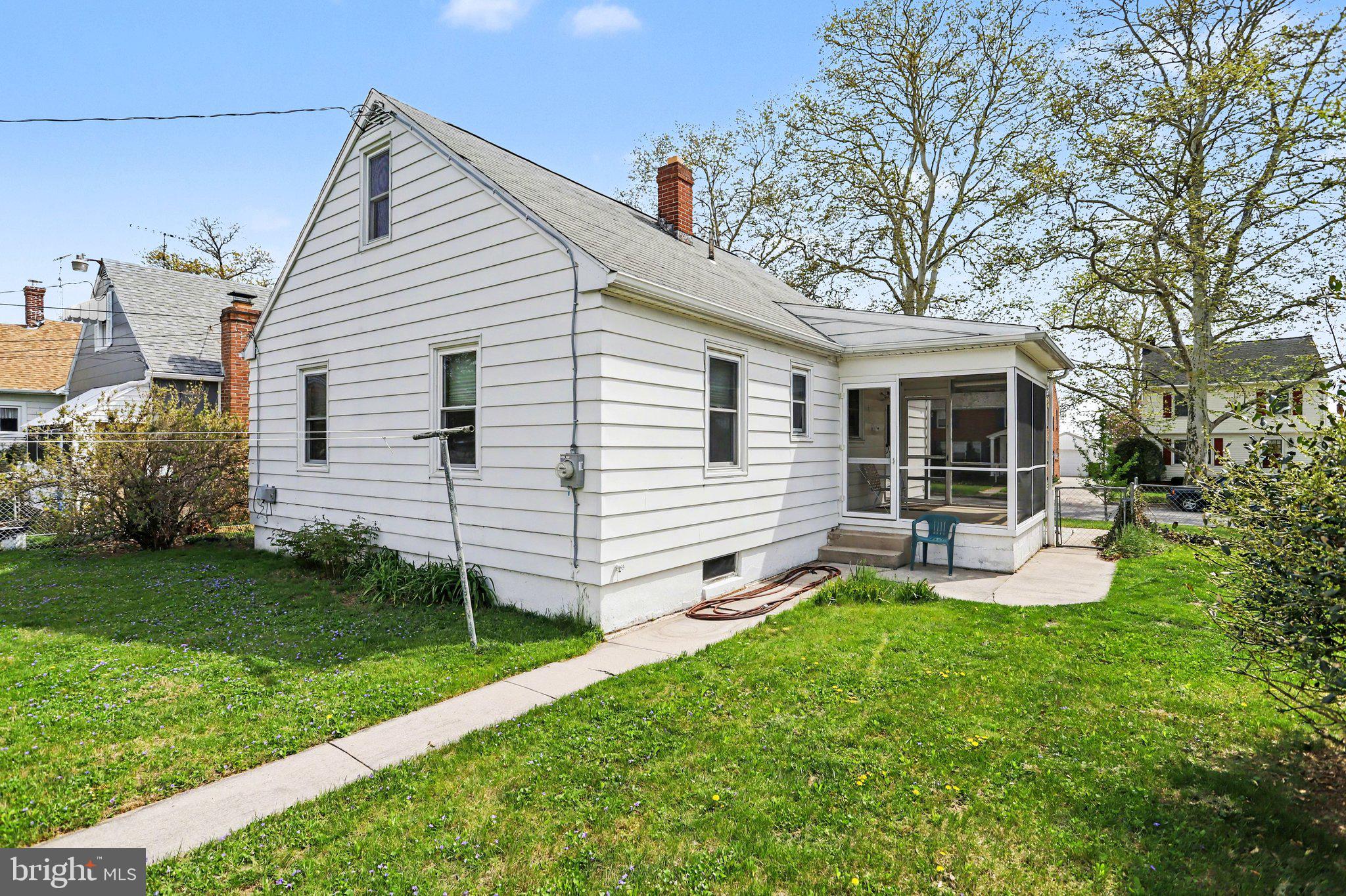 932 East Walnut Street Hanover, PA 17331 - Photo 23 of 44 a view of a house with backyard sitting area and garden