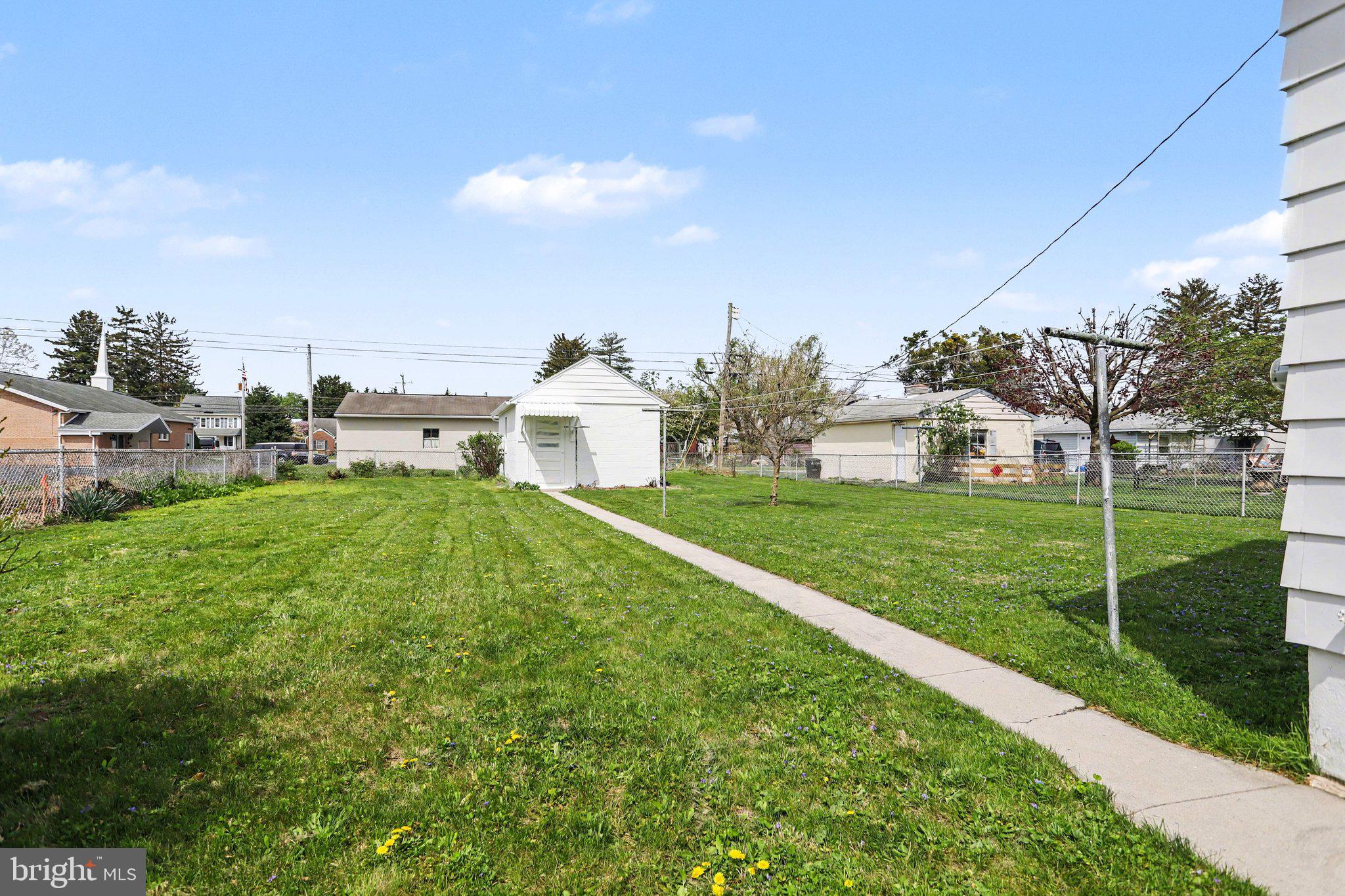 932 East Walnut Street Hanover, PA 17331 - Photo 28 of 44 a house view with garden space and trees