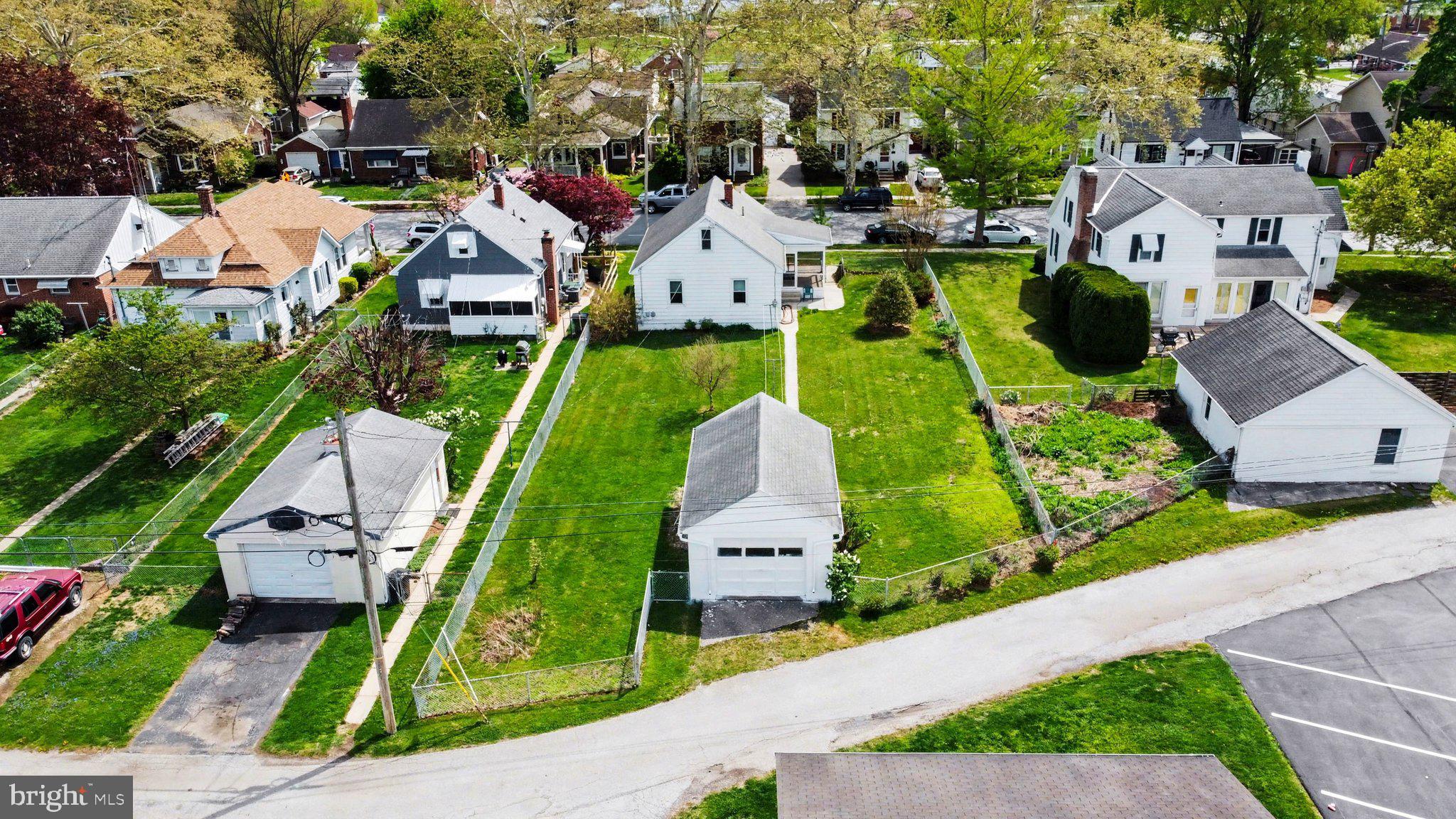 932 East Walnut Street Hanover, PA 17331 - Photo 32 of 44 an aerial view of multiple houses with yard