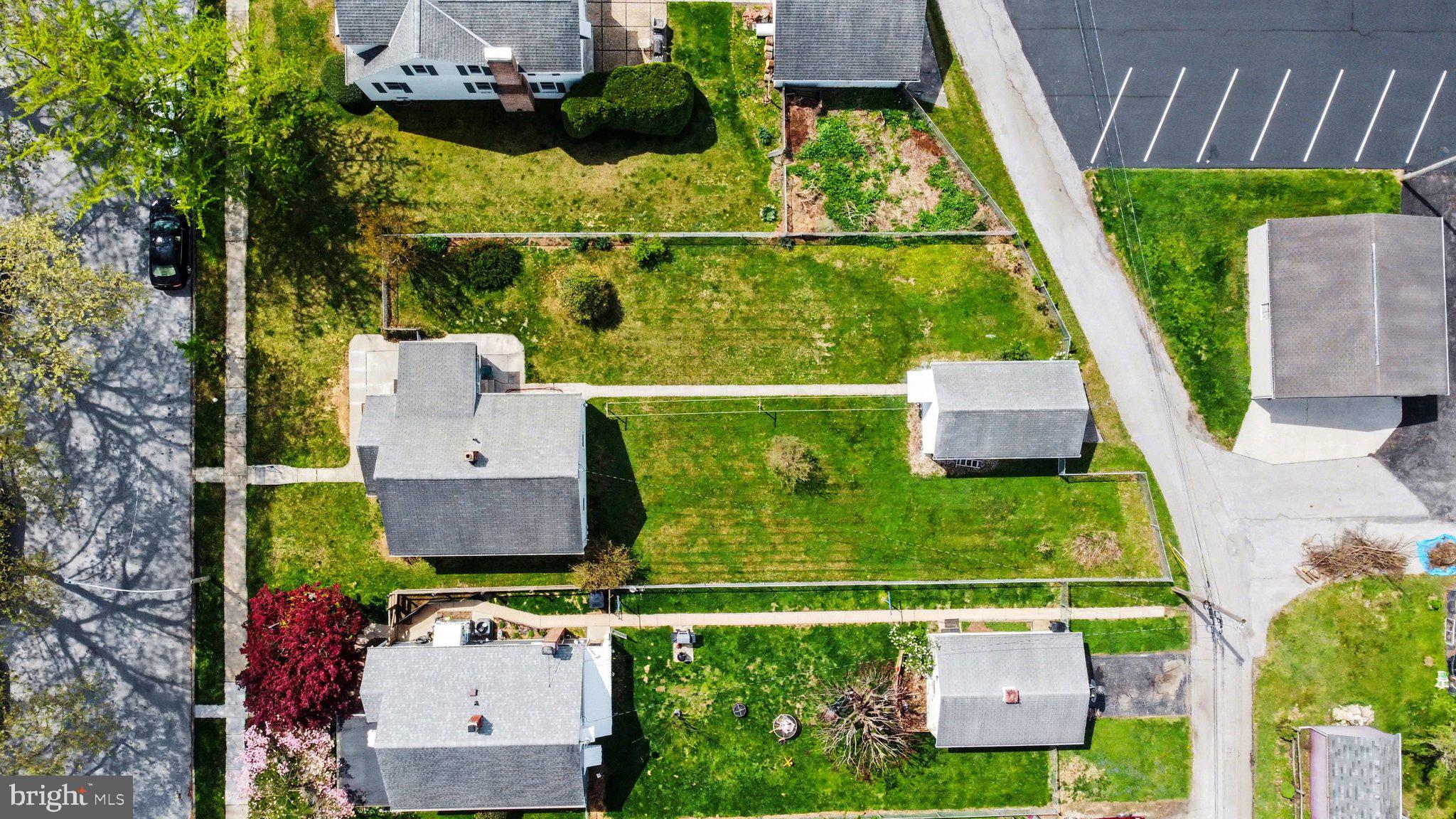 932 East Walnut Street Hanover, PA 17331 - Photo 34 of 44 an aerial view of a house with a garden and swimming pool