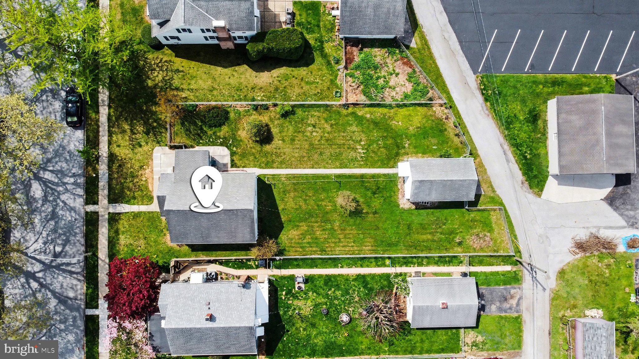 932 East Walnut Street Hanover, PA 17331 - Photo 40 of 44 an aerial view of a house with garden space sitting space and swimming pool