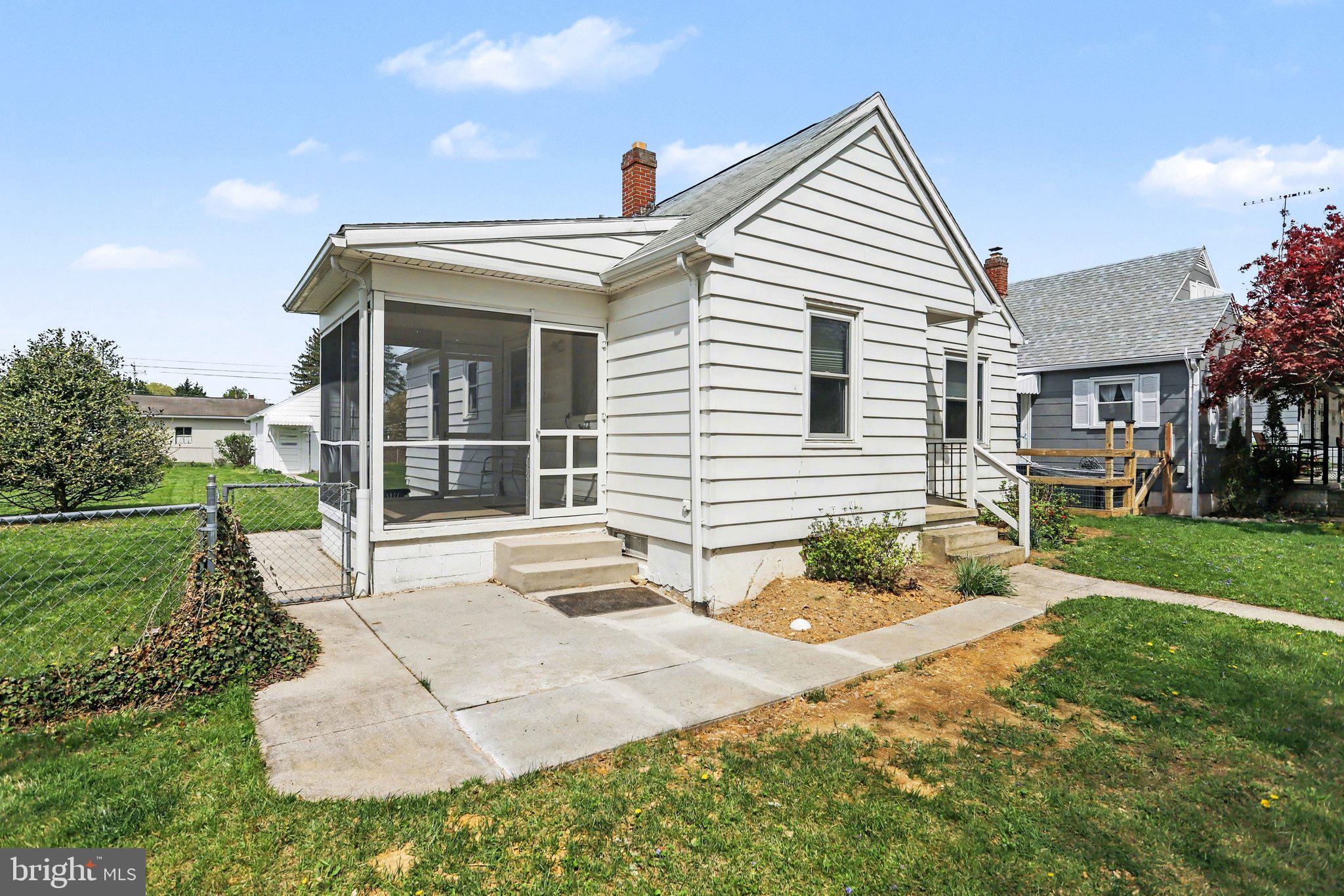 932 East Walnut Street Hanover, PA 17331 - Photo 4 of 44 front view of a house with a yard