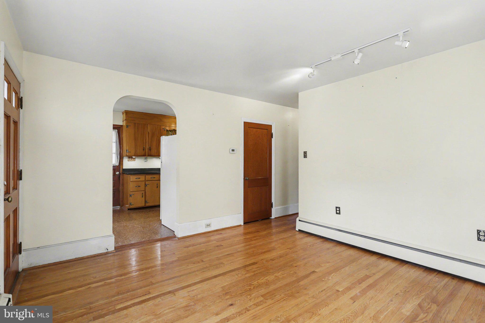 932 East Walnut Street Hanover, PA 17331 - Photo 7 of 44 an empty room with wooden floor and closet