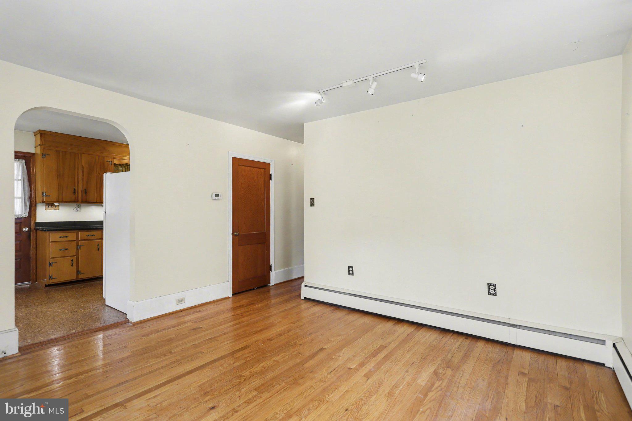932 East Walnut Street Hanover, PA 17331 - Photo 8 of 44 a view of empty room with wooden floor
