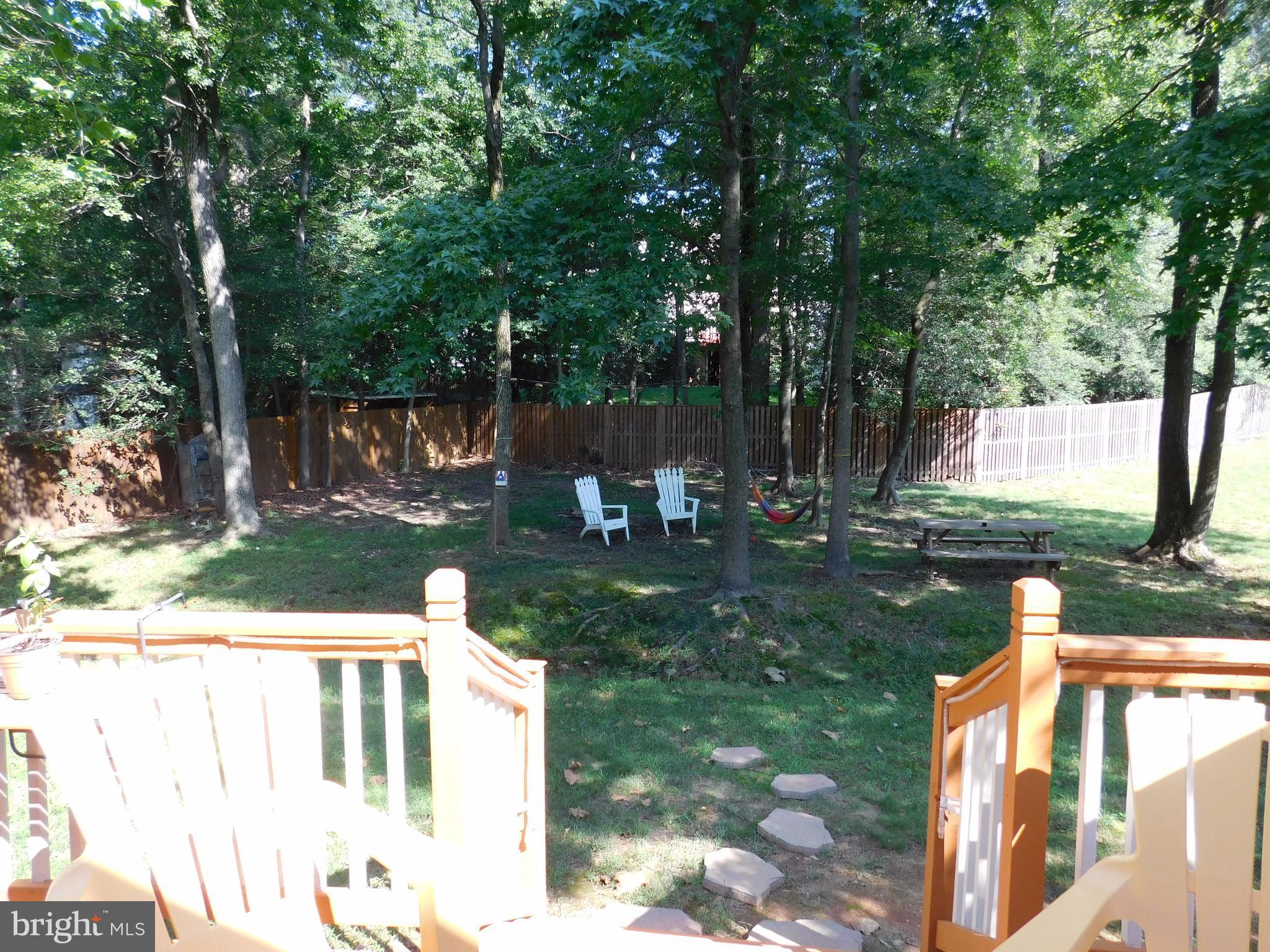12212 Snowden Woods Road Laurel, MD 20708 - Photo 17 of 18 large back yard with mature trees