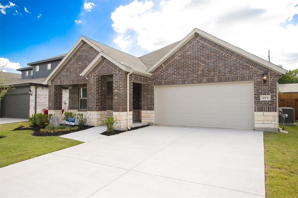 404 Castle Road Sherman, TX 75092 - Photo 2 of 25 a view of a house with backyard porch and garden