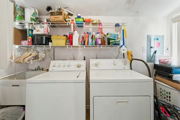 a utility room with dryer and washer