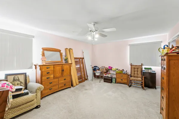 a view of a livingroom with furniture and toys