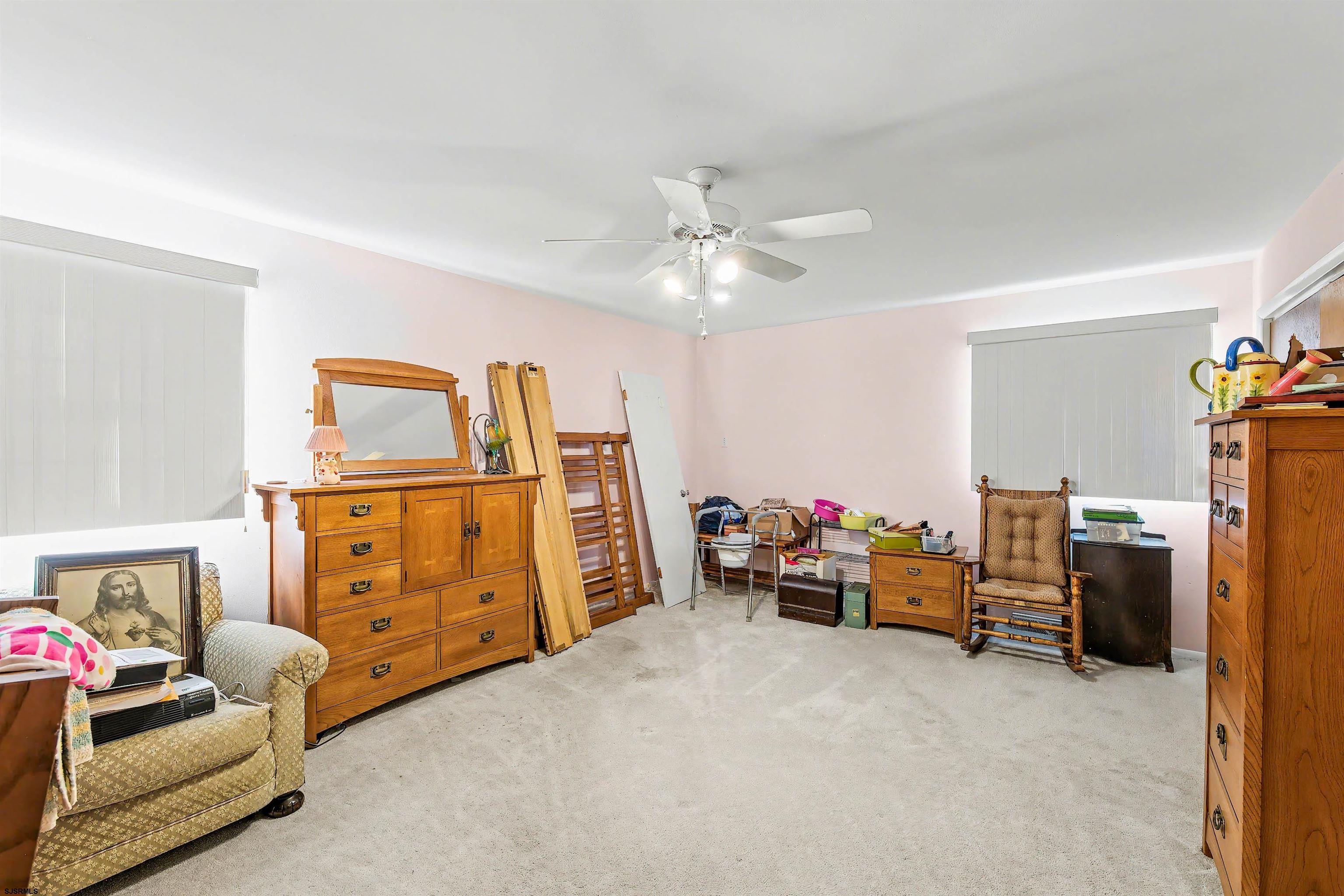 116 Haddon Road Somers Point, NJ 08244 - Photo 13 of 21 a view of a livingroom with furniture and toys