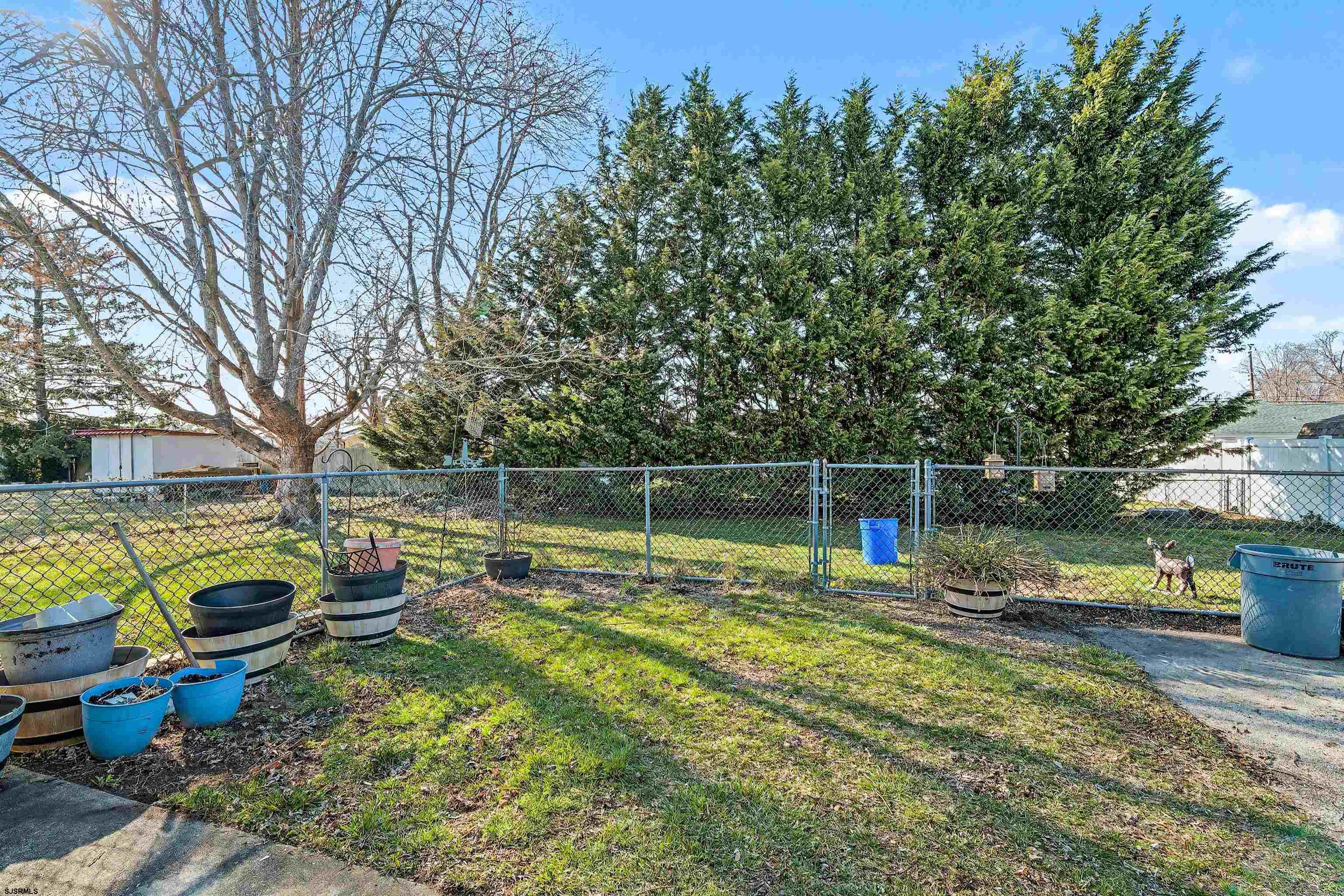 116 Haddon Road Somers Point, NJ 08244 - Photo 18 of 21 a view of a swimming pool with a patio and a yard